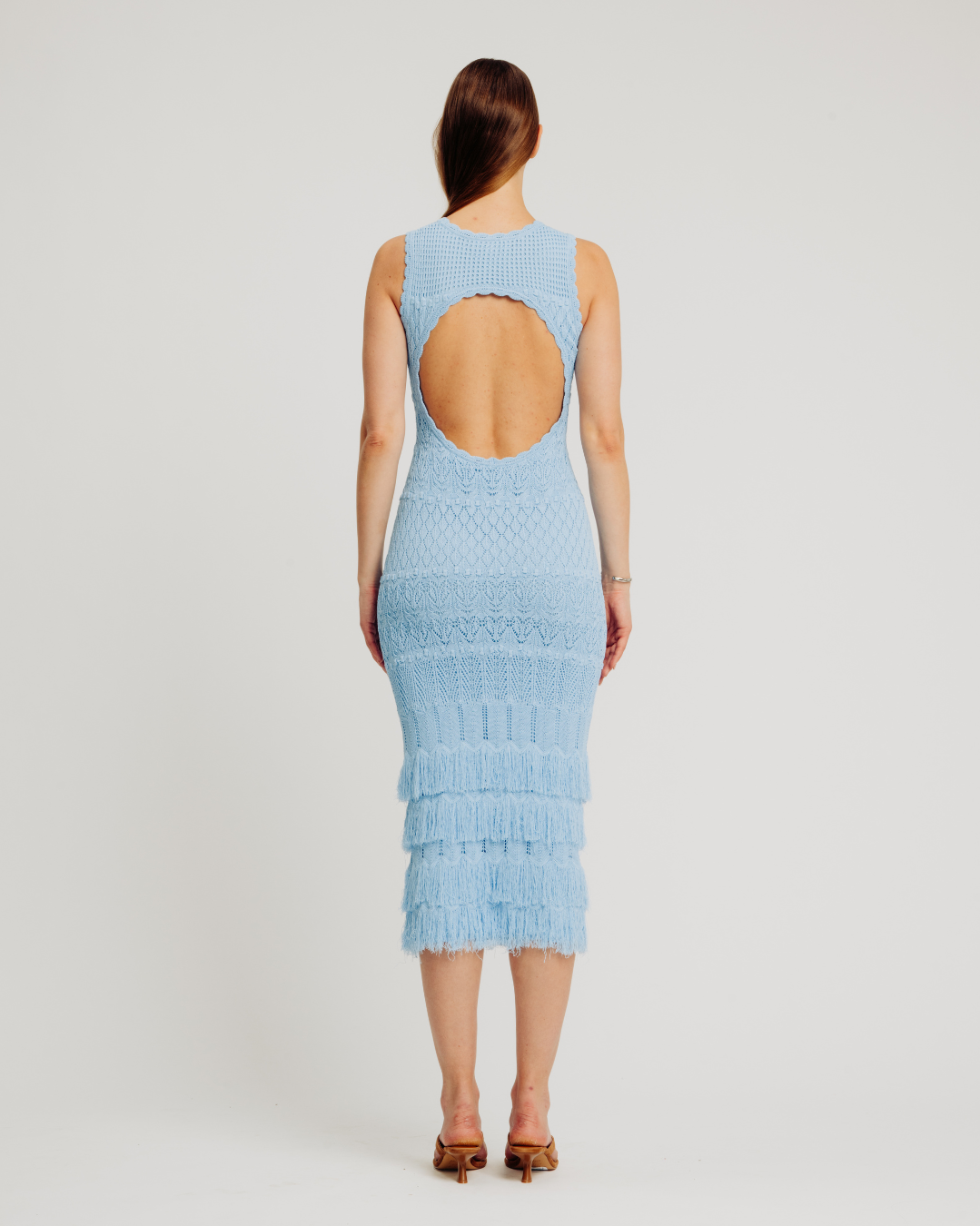 torn by ronny kobo open back knit dress The Toby Dress, a vision of bohemian beauty that channels the carefree spirit of summer